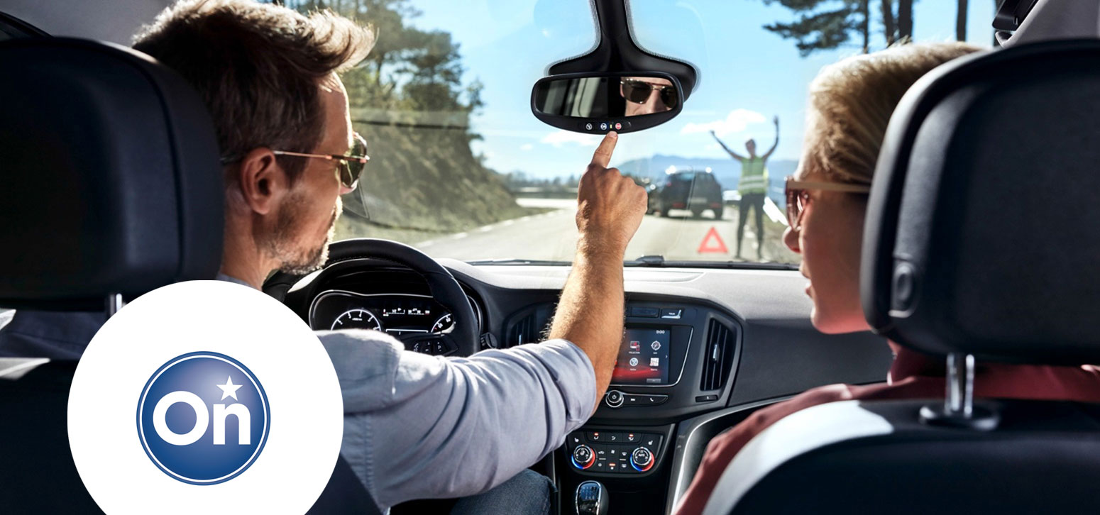 Driver Using OnStar & Connected Services in Vehicle